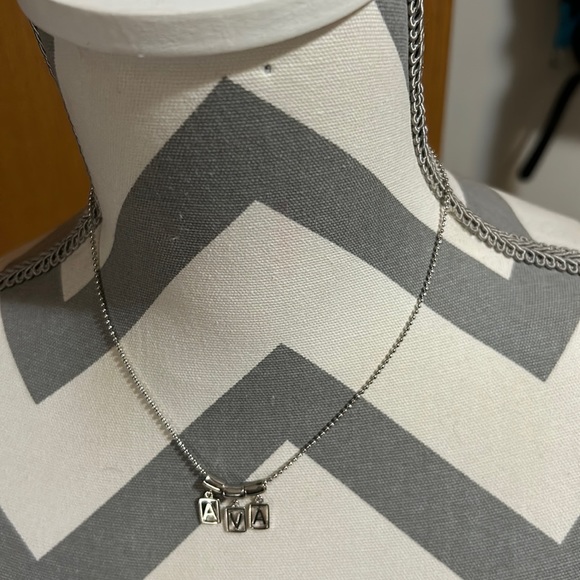 Kids 16” silver necklace with Ava name. Super cute. Like new gently used. - Picture 1 of 3